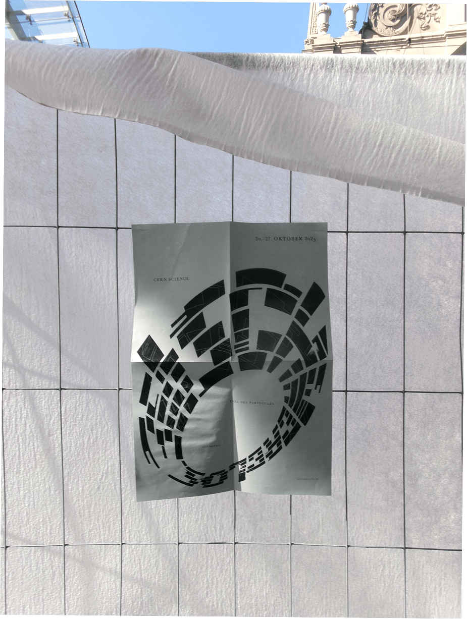 Schwerelos poster hanging on a fence covered with white fabric